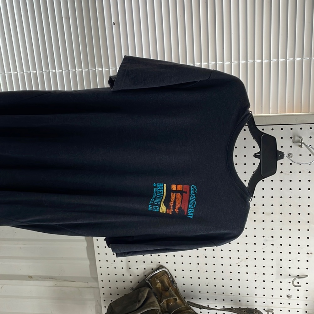 I am selling a L.G T/shirt made in Pakistan by G.H Bass $ Co.